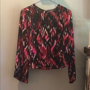 Multi colored flowy blouse.